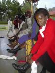 Outfitting our students with boots for beekeeping course at Baraka College